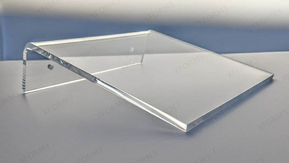 Compact clear acrylic shelf with a polished front edge and pre-drilled mounting lip