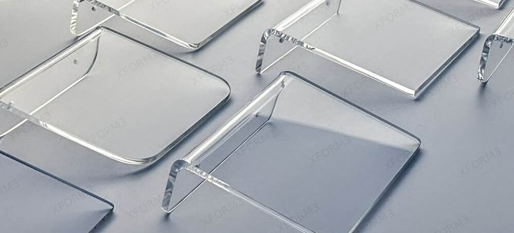 Several clear acrylic shelves in different dimensions and corner shapes