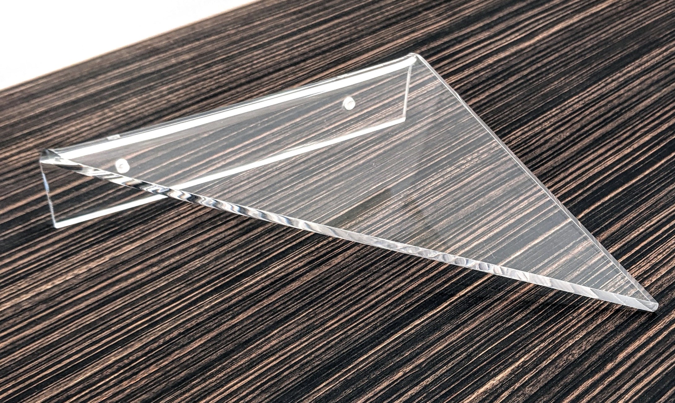 Triangular floating clear acrylic corner shelf
